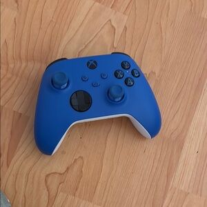 Blue and Black Wireless Controller with Textured Design